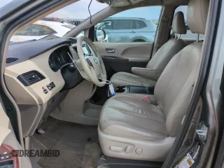 2013 Toyota Sienna XLE with VIN 5TDDK3DC1DS063127, listed as a Copart auction lot 58387015 with 196,574 mi miles and Salvage title. Bid and sale history available at DreamBid. Image 7.