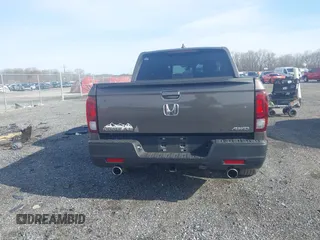 2022 Honda Ridgeline RTL z VIN 5FPYK3F51NB038239, wystawiony jako IAAI lot #41937070 z przebiegiem 39 012 mil mil oraz . Historia ofert i sprzedaży dostępna na DreamBid. Obrazek 16.