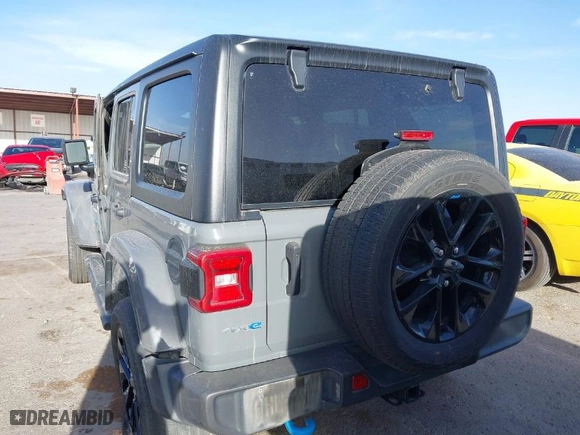 2023 Jeep Wrangler 4xe Sahara with VIN 1C4JJXP68PW661190, listed as a IAAI auction lot 41816483 with 41,877 mi miles. Bid and sale history available at carsss.com. Image 16.