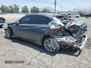 2015 Infiniti Q50 Premium с VIN JN1BV7AP7FM343861, выставлен на аукционе Copart как лот 60691395 с пробегом 95 927 миль миль и Списание • Salvage title. История ставок и продаж доступна на DreamBid. Изображение 2.