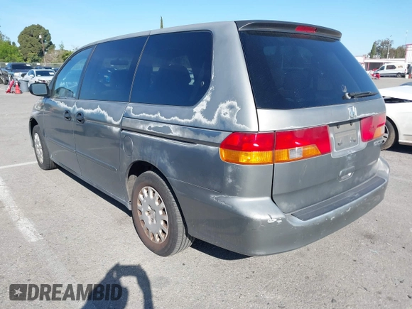 2002 Honda Odyssey LX z VIN 2HKRL18542H553437, wystawiony jako IAAI lot #41824481 z przebiegiem 222 428 mil mil oraz . Historia ofert i sprzedaży dostępna na DreamBid. Obrazek 3.