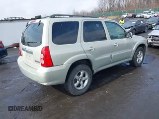 2006 Mazda Tribute S with VIN 4F2YZ04136KM15337, listed as a IAAI auction lot 41689177 with 153,720 mi miles and . Bid and sale history available at DreamBid. Image 4.