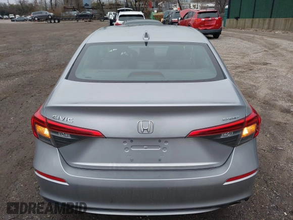 2022 Honda Civic Sport z VIN 2HGFE2F56NH537728, wystawiony jako IAAI lot #41772928 z przebiegiem 38 147 mil mil oraz . Historia ofert i sprzedaży dostępna na DreamBid. Obrazek 16.