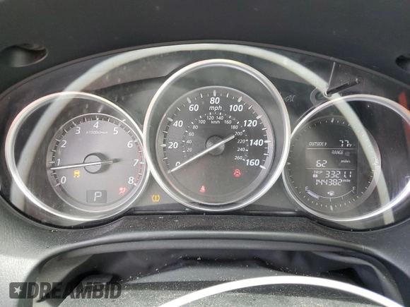 2014 Mazda CX-5 Grand Touring with VIN JM3KE4DY3E0304908, listed as a Copart auction lot 53873655 with 144,382 mi miles and Salvage Title. Bid and sale history available at DreamBid. Image 9.