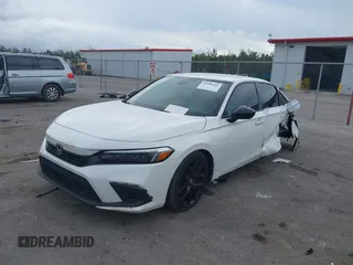 2022 Honda Civic Sport z VIN 2HGFE2F58NH560122, wystawiony jako IAAI lot #41193826 z przebiegiem 50 005 mil mil oraz . Historia ofert i sprzedaży dostępna na DreamBid. Obrazek 17.