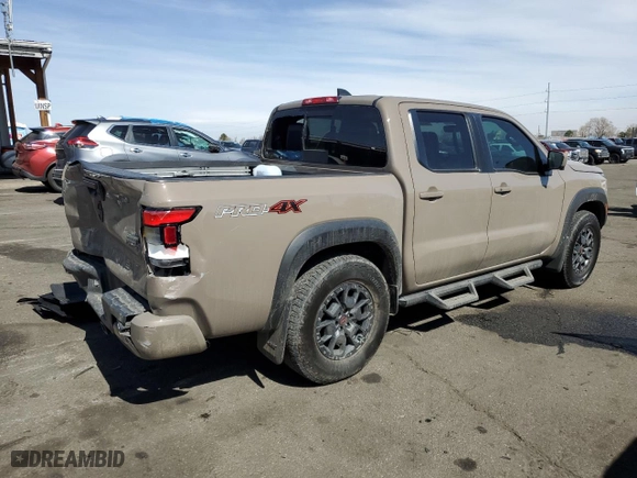 2023 Nissan Frontier PRO-4X with VIN 1N6ED1EK2PN634253, listed as a Copart auction lot 48523695 with 28,138 mi miles and Salvage Title. Bid and sale history available at carsss.com. Image 3.