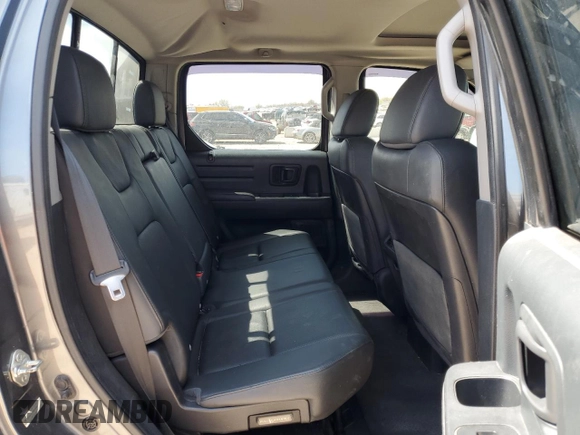 2013 Honda Ridgeline RTL with VIN 5FPYK1F51DB012680, listed as a Copart auction lot 50987085 with 63,372 mi miles and Salvage Title. Bid and sale history available at carsss.com. Image 10.