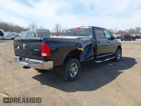 2011 Ram 2500 Big Horn with VIN 3D7UT2CL9BG589970, listed as a IAAI auction lot 41791498 with 100,773 mi miles. Bid and sale history available at carsss.com. Image 4.