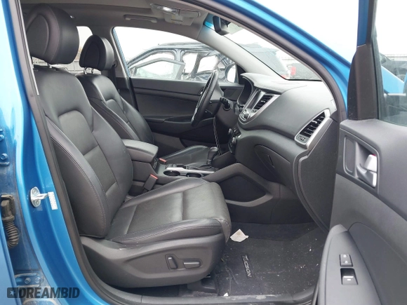 2016 Hyundai Tucson Eco with VIN KM8J3CA28GU041357, listed as a IAAI auction lot 41661997 with 87,000 mi miles. Bid and sale history available at carsss.com. Image 5.