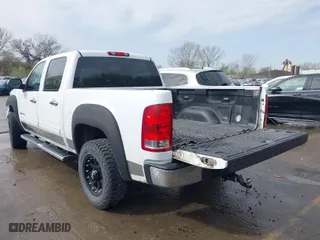 2010 GMC Sierra 1500 SLE with VIN 3GTRKVE31AG263130, listed as a IAAI auction lot 41903674 with 207,828 mi miles. Bid and sale history available at carsss.com. Image 3.