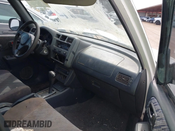 1998 Toyota RAV4 with VIN JT3GP10V3W7038970, listed as a IAAI auction lot 42377816 with 221,365 mi miles and . Bid and sale history available at DreamBid. Image 5.