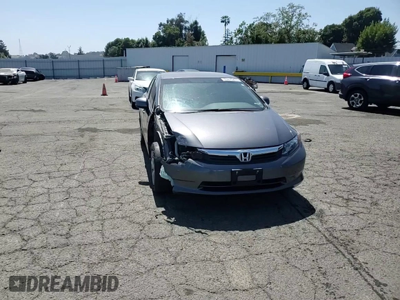 2012 Honda Civic LX z VIN 2HGFB2F59CH603985, wystawiony jako Copart lot #55675435 z przebiegiem 125 567 mil mil oraz Szkoda całkowita • Salvage title. Historia ofert i sprzedaży dostępna na DreamBid. Obrazek 14.