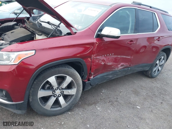 2019 Chevrolet Traverse LT Leather with VIN 1GNEVHKW1KJ164692, listed as a IAAI auction lot 41800874 with 76,866 mi miles. Bid and sale history available at carsss.com. Image 6.