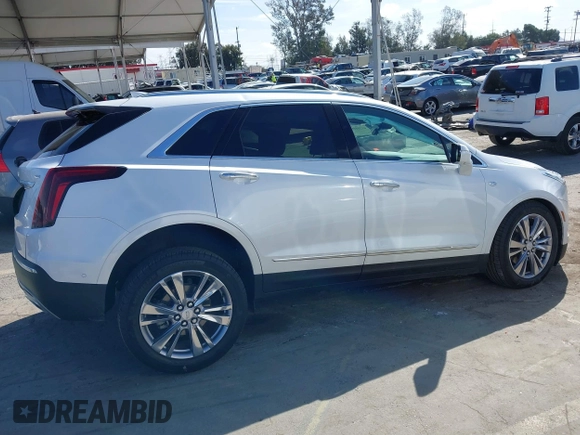 2023 Cadillac XT5 AWD Premium Luxury with VIN 1GYKNDRS4PZ195431, listed as a IAAI auction lot 41714459 with 13,207 mi miles and . Bid and sale history available at DreamBid. Image 13.