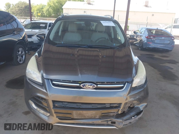 2015 Ford Escape Titanium with VIN 1FMCU0J92FUA20469, listed as a IAAI auction lot 42510293 with 161,466 mi miles and . Bid and sale history available at DreamBid. Image 13.