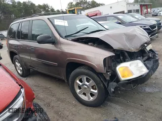 2008 GMC Envoy SLE2 with VIN 1GKDS13S882139862, listed as a IAAI auction lot 41458976 with 195,973 mi miles. Bid and sale history available at carsss.com. Image 1.