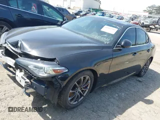 2018 Alfa Romeo Giulia with VIN ZARFAEBN7J7580536, listed as a IAAI auction lot 41883289 with 87,776 mi miles. Bid and sale history available at carsss.com. Image 2.