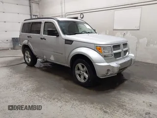 2010 Dodge Nitro SXT z VIN 1D4PU5GK4AW148144, wystawiony jako IAAI lot #42161980 z przebiegiem 148 430 mil mil oraz . Historia ofert i sprzedaży dostępna na DreamBid. Obrazek 1.