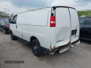 2003 Chevrolet Express Cargo with VIN 1GCGG25V031175986, listed as a IAAI auction lot 42144402 with 353,661 mi miles and . Bid and sale history available at DreamBid. Image 3.