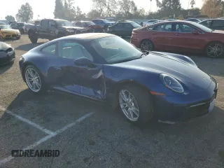 2022 Porsche 911 Carrera with VIN WP0AA2A99NS205256, listed as a Copart auction lot 43082515 with 21,682 mi miles and Salvage Title. Bid and sale history available at carsss.com. Image 4.