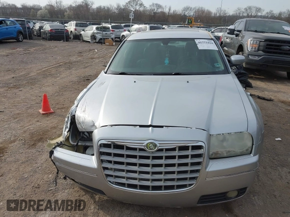 2005 Chrysler 300 with VIN 2C3JA53G85H159623, listed as a IAAI auction lot 41773424 with 127,764 mi miles. Bid and sale history available at carsss.com. Image 6.