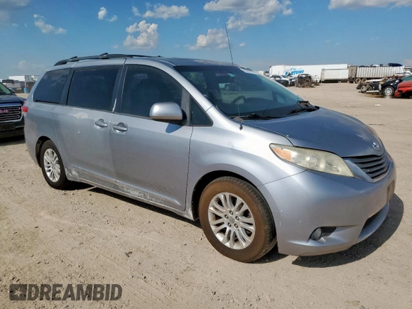 2012 Toyota Sienna XLE AAS with VIN 5TDYK3DC5CS262097, listed as a Copart auction lot 60682995 with 227,361 mi miles and Clean title. Bid and sale history available at DreamBid. Image 4.