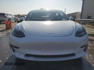 2022 Tesla Model 3 Long Range with VIN 5YJ3E1EB2NF199141, listed as a Copart auction lot 53069145 with 67,140 mi miles and Non Repairable. Bid and sale history available at DreamBid. Image 5.