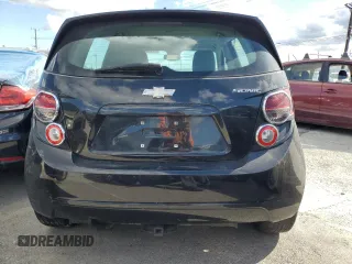 2013 Chevrolet Sonic LS with VIN 1G1JA6SG4D4239041, listed as a Copart auction lot 48250105 with 103,370 mi miles and Salvage title. Bid and sale history available at DreamBid. Image 6.