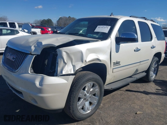 2014 GMC Yukon SLT with VIN 1GKS1CE01ER179379, listed as a IAAI auction lot 41717271 with 136,999 mi miles. Bid and sale history available at carsss.com. Image 2.