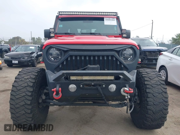 2020 Jeep Gladiator Rubicon with VIN 1C6JJTBG4LL178260, listed as a IAAI auction lot 42602460 with 61,899 mi miles and . Bid and sale history available at DreamBid. Image 12.