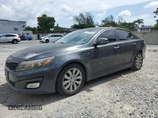 2015 Kia Optima LX with VIN 5XXGM4A71FG444100, listed as a Copart auction lot 63930945 with 128,778 mi miles and Salvage title. Bid and sale history available at DreamBid. Image 1.