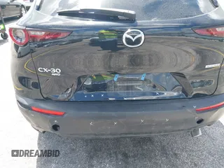 2025 Mazda CX-30 S Preferred with VIN 3MVDMBCM0SM798708, listed as a IAAI auction lot 42133091 with 4,305 mi miles and . Bid and sale history available at DreamBid. Image 6.