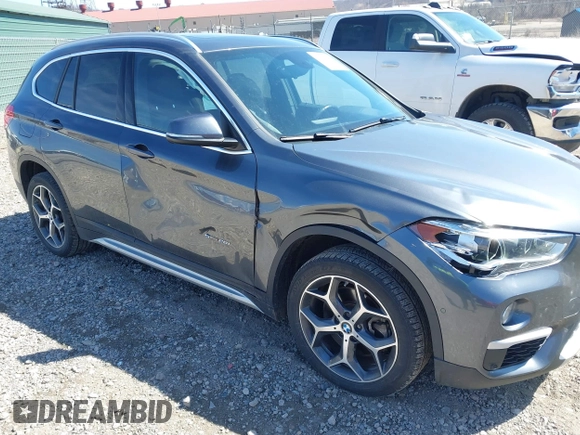 2017 BMW X1 sDrive28i with VIN WBXHU7C37H5H32815, listed as a IAAI auction lot 41837113 with 67,097 mi miles. Bid and sale history available at carsss.com. Image 6.