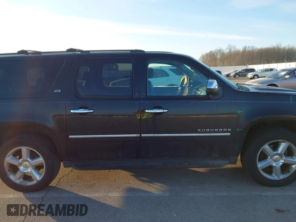 2010 Chevrolet Suburban LTZ with VIN 1GNUKKE3XAR142743, listed as a IAAI auction lot 41413380 with 236,384 mi miles. Bid and sale history available at carsss.com. Image 13.