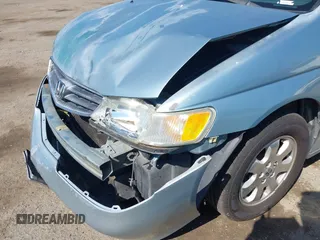 2003 Honda Odyssey EX-L with VIN 5FNRL18973B148675, listed as a IAAI auction lot 41992952 with 232,013 mi miles and . Bid and sale history available at DreamBid. Image 17.