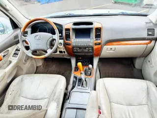 2003 Lexus GX 470 z VIN JTJBT20X130004567, wystawiony jako Copart lot #57682615 z przebiegiem 237 809 mil mil oraz Szkoda całkowita • Salvage title. Historia ofert i sprzedaży dostępna na DreamBid. Obrazek 9.