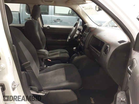 2014 Jeep Patriot Latitude with VIN 1C4NJPFB8ED717749, listed as a IAAI auction lot 41962155 with 147,755 mi miles and . Bid and sale history available at carsss.com. Image 5.