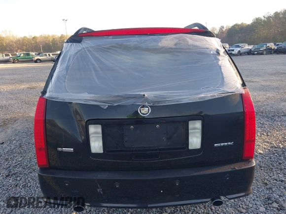 2004 Cadillac SRX with VIN 1GYDE63A040116714, listed as a IAAI auction lot 41828311 with 128,372 mi miles. Bid and sale history available at carsss.com. Image 6.