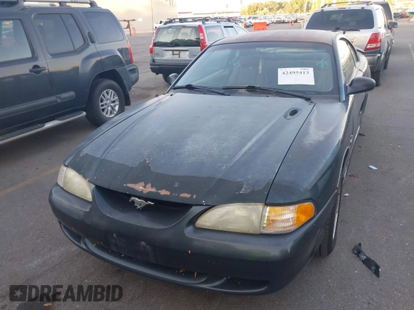 1998 Ford Mustang z VIN 1FAFP4041WF161422, wystawiony jako IAAI lot #42495413 z przebiegiem 207 906 mil mil oraz . Historia ofert i sprzedaży dostępna na DreamBid. Obrazek 6.