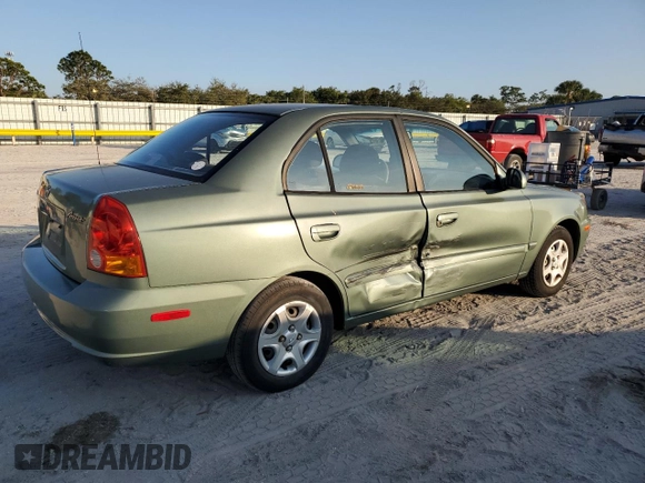 2005 Hyundai Accent GLS with VIN KMHCG45C35U595666, listed as a Copart auction lot 88294365 with 70,497 mi miles and Salvage Title. Bid and sale history available at carsss.com. Image 3.