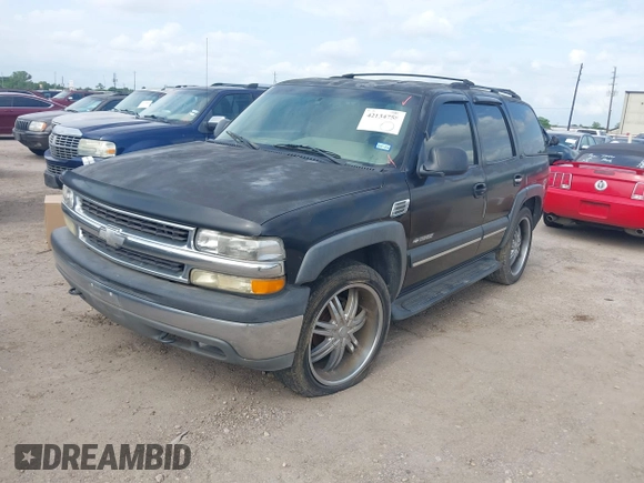 2002 Chevrolet Tahoe LT with VIN 1GNEC13Z22J335701, listed as a IAAI auction lot 42134758 with 250,668 mi miles and . Bid and sale history available at DreamBid. Image 2.