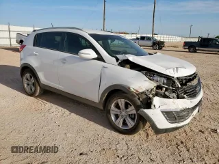 2012 Kia Sportage LX z VIN KNDPBCA22C7261796, wystawiony jako Copart lot #57284425 z przebiegiem 133 383 mil mil oraz Szkoda całkowita • Salvage title. Historia ofert i sprzedaży dostępna na DreamBid. Obrazek 4.