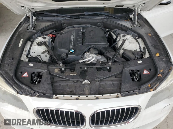 2013 BMW 7 Series 740i with VIN WBAYA6C5XDD143639, listed as a Copart auction lot 62296694 with 97,082 mi miles and Salvage Title. Bid and sale history available at carsss.com. Image 11.