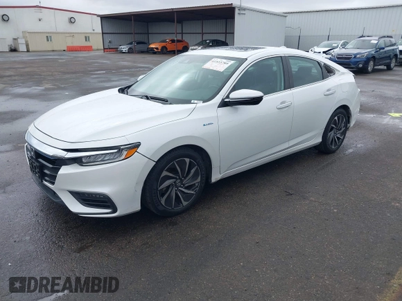 2021 Honda Insight Touring with VIN 19XZE4F96ME000099, listed as a IAAI auction lot 41533789 with 83,490 mi miles and . Bid and sale history available at carsss.com. Image 18.