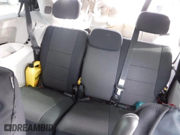 2009 Dodge Grand Caravan SE z VIN 2D8HN44E19R693683, wystawiony jako Copart lot #48208395 z przebiegiem 142 334 mil mil oraz Szkoda całkowita • Salvage title. Historia ofert i sprzedaży dostępna na DreamBid. Obrazek 9.