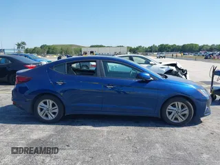 2020 Hyundai Elantra SEL z VIN 5NPD84LF1LH570792, wystawiony jako IAAI lot #42138863 z przebiegiem 27 768 mil mil oraz . Historia ofert i sprzedaży dostępna na DreamBid. Obrazek 13.