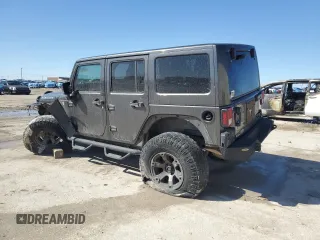 2014 Jeep Wrangler Unlimited Rubicon with VIN 1C4BJWFG0EL199649, listed as a Copart auction lot 47801775 with 141,116 mi miles and Salvage Title. Bid and sale history available at carsss.com. Image 2.