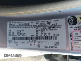2019 Ford Fiesta SE with VIN 3FADP4EJ0KM107058, listed as a IAAI auction lot 40979683 with 116,854 mi miles. Bid and sale history available at carsss.com. Image 9.
