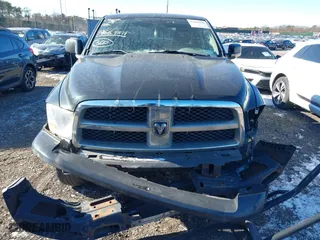 2009 Dodge Ram 1500 SLT with VIN 1D3HV18P39S803096, listed as a IAAI auction lot 39664811 with 180,966 mi miles. Bid and sale history available at carsss.com. Image 6.