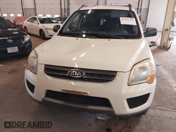2009 Kia Sportage LX with VIN KNDJE723497563630, listed as a IAAI auction lot 41911423 with 213,040 mi miles. Bid and sale history available at carsss.com. Image 12.